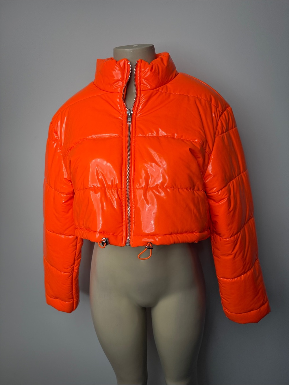 AKIRA Shiny Cropped Puffer Jacket in Bright Orange